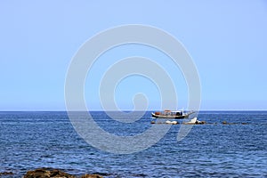 Excursion boat cruising Venetian harbour and mediterranean sea of Chania, Crete, Greece