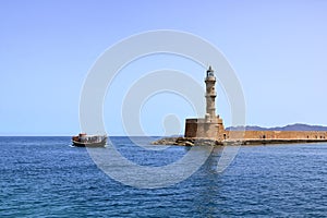 Excursion boat cruising Venetian harbour and mediterranean sea of Chania, Crete, Greece