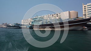 Excursion on traditional Abra boat at the creek in Dubai, UAE timelapse