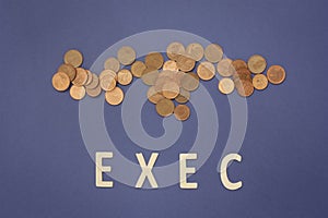 Exec written with wooden letters on a blue background photo