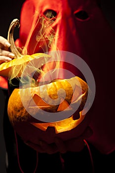 Executioner with halloween pumpkin