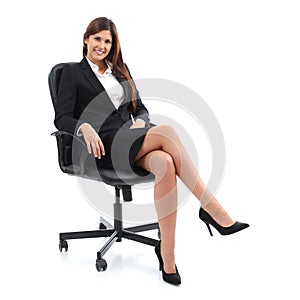 Executive business woman sitting on a chair