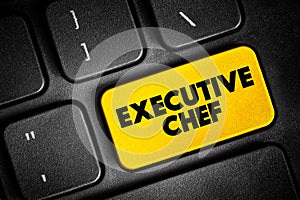 Executive Chef - leads and manages the kitchen and chefs of a restaurant or hotel, text concept button on keyboard