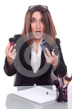 Executive desk with makeup brushes