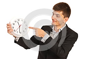 Executive man indicate to clock