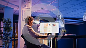 Executive manager analyzing statistics data at desk