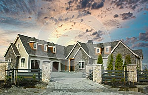 Executive Mansion Home House Maison Rock Stucco Front Exterior Pink Cloudy Sunset Sky Background