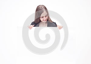 Executive`s young business woman showing blank banner.