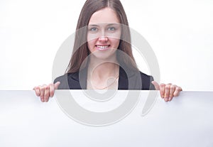 Executive`s young business woman showing blank banner. isolated on white background