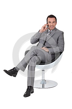 Executive in a swivel chair
