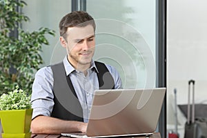 Executive working in an hotel during business travel