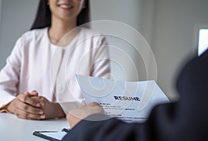 Executives are interviewing candidates. Focusing on resume writing tips, applicant qualifications, interview skills and pre-