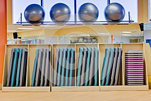 Exercise balls and aerobic steps in gym