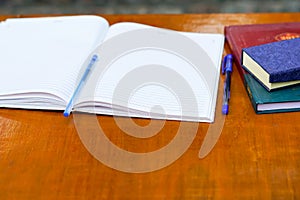 An exercise book open on a table