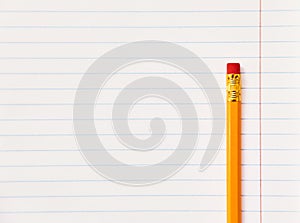 Exercise book with pencil.