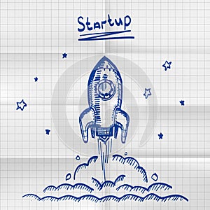 Exercise book sketch rocket startup.