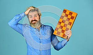 Exercise for brain. Chess figures. Intellectual games. Intelligent bearded hipster. Cognitive skills. Game strategy