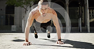 Exercise, city ground and strong man doing push up for fitness, bodybuilder workout or outdoor training. Active