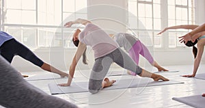 Exercise, group of yoga women stretching, meditation and in studio together for fitness, wellness and health. Workout