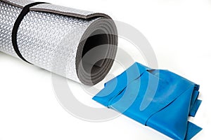 Exercise mat and training rubber on a white background