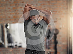 Exercise, stretch and man at gym for training, health and wellness against a brick wall background mockup. Fitness