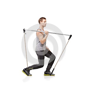 Exercise, thinking and resistance band with a young man in studio isolated on a white background for health. Idea