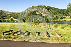 An exercise or workout area next to the small river in Algard town