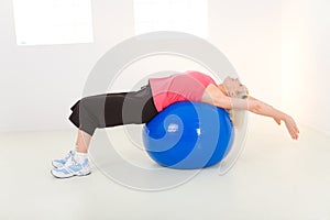 Exercising with fitness ball