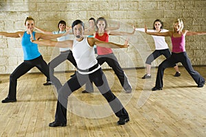Exercising with fitness instructor