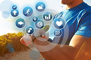 Exercising Man Checking Activity Tracker With Health Icons