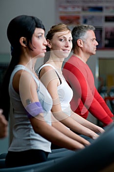 Exercising with treadmill at gym