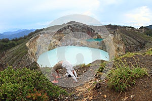 Exercising yoga on Kelimutu