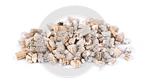 Exfoliated vermiculite mineral, isolated on white background. Mineral used in gardening.