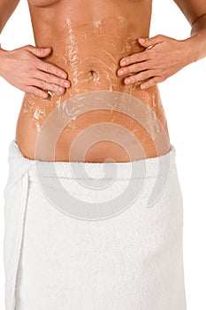 Exfoliation Woman Putting scrub on abdomen