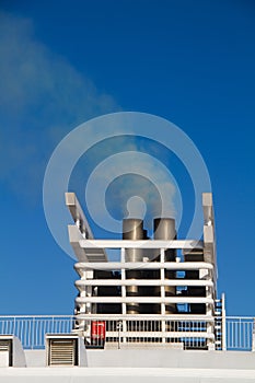 Exhaust gas from the smokestack of a ship