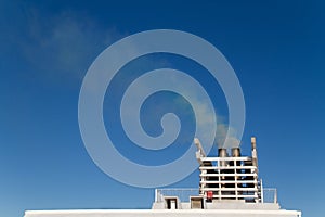 Exhaust gas from the smokestack of a ship