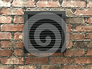 Exhaust Grill Vent in brick wall Photo image