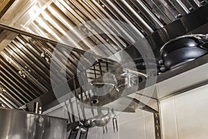 Exhaust systems, hood filters detail in a professional kitchen photo