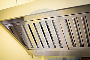 Exhaust systems, hood filters detail in a professional kitchen.