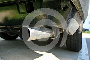 the exhaust tailpipe of the old classic veteran car photo