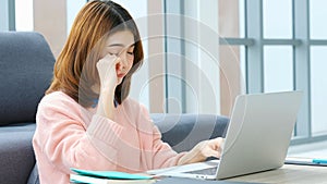 Exhausted asian woman take a break while working with laptop computer at home office, Tried asia female  take a nap from overwork