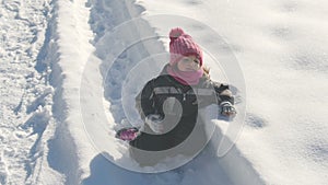 Exhausted baby whine on snow background