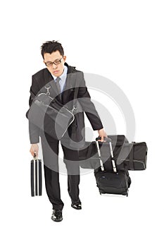 Exhausted businessman taking all bags