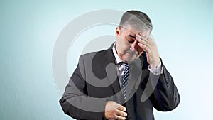 Exhausted Businessman Yawning and Rubbing Eyes in Fatigue