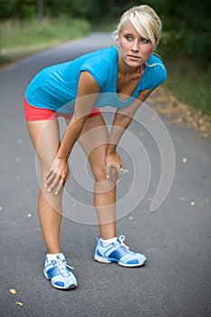 Exhausted girl in park