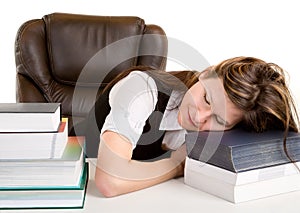 Exhausted Student Sleeping on Her Books