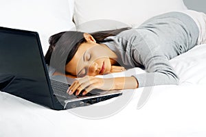 Exhausted woman laptop