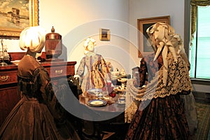 Exhibit of mannequins in period dress, gathered in area of music room,Canfield Casino,Saratoga Springs,New York,2016
