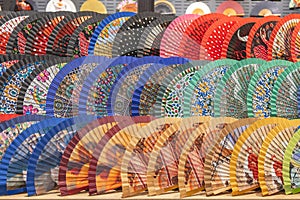 Exhibition of decorated hand fans for decoration and tourism souvenir