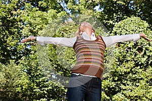 Exhilarated woman outdoors